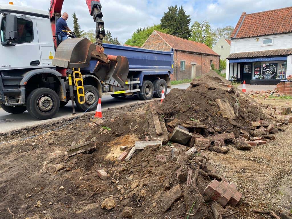 This is a photo of a dig out being carried out for the installation of a new tarmac driveway. Works being carried out by Newport Pagnell Driveways